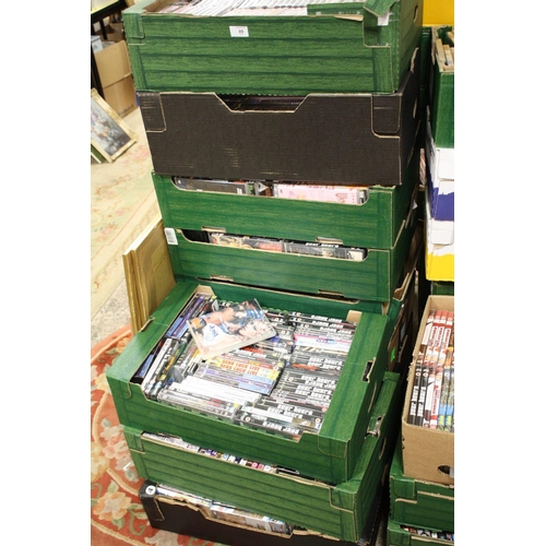 89 - TEN TRAYS OF DVDS