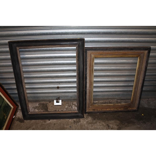 32 - TWO GILT AND EBONISED WOODEN PICTURE FRAMES - LARGEST REBATE SIZE 65.5CM X 49CM - SMALLEST REBATE 51... 