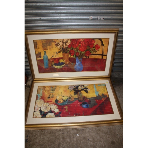 34 - A PAIR OF LARGE GILT FRAMED AND GLAZED STILL LIFE STUDIES OF TABLE TOP SCENES - OVERALL SIZE 122CM X... 