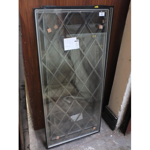 527 - A PAIR OF LEADED WINDOWS 91 CM X 48 CM TOGETHER WITH A SMALLER LEADED WINDOW 83 CM X 43 CM