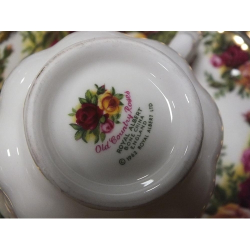 104 - A TRAY OF ROYAL ALBERT OLD COUNTRY ROSES, TO INCLUDE TEA POT, TRIOS, PEPPERETTES ETC.