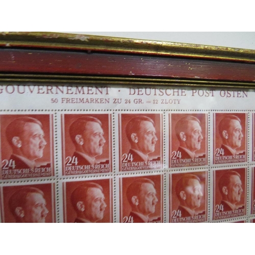 377 - A SHEET OF 50 WW2 DEUTCHES REICH STAMPS SHOWING THE PROFILE OF ADOLF HITLER SET IN A PERIOD GLAZED F... 
