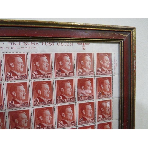 377 - A SHEET OF 50 WW2 DEUTCHES REICH STAMPS SHOWING THE PROFILE OF ADOLF HITLER SET IN A PERIOD GLAZED F... 