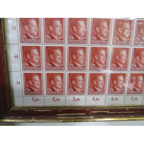 377 - A SHEET OF 50 WW2 DEUTCHES REICH STAMPS SHOWING THE PROFILE OF ADOLF HITLER SET IN A PERIOD GLAZED F... 