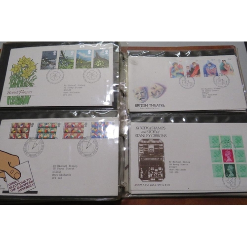380 - AN ALBUM OF POST OFFICE FIRST DAY COVERS,  TOGETHER WITH THREE COMMEMORATIVE COINS AND STAMPS FIRST ... 