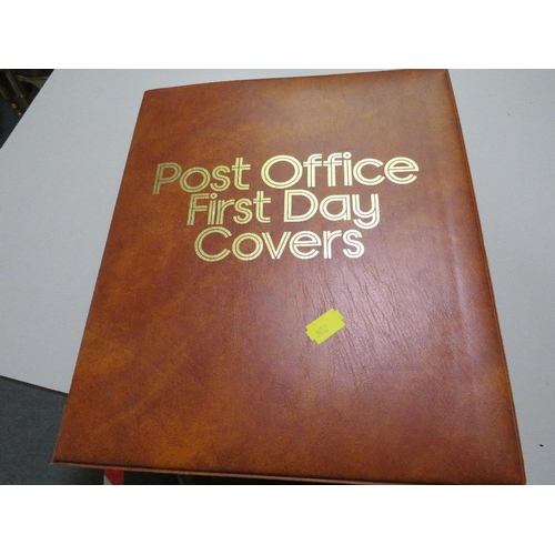 380 - AN ALBUM OF POST OFFICE FIRST DAY COVERS,  TOGETHER WITH THREE COMMEMORATIVE COINS AND STAMPS FIRST ... 