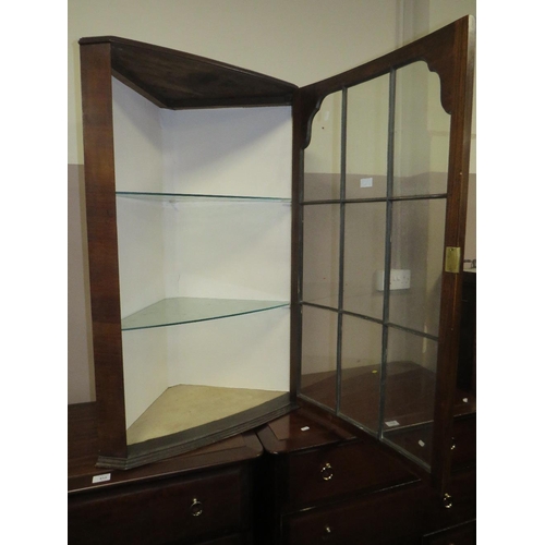 617 - AN ANTIQUE WALNUT GLAZED HANGING CORNER CABINET H-100 CM
