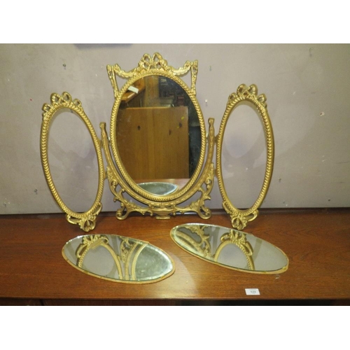 627 - A VINTAGE OAK FRAMED OCTAGONAL MIRROR, W-46 CM WITH A GILT MIRROR, OVAL DECO MIRROR AND A GILT TRIPL... 