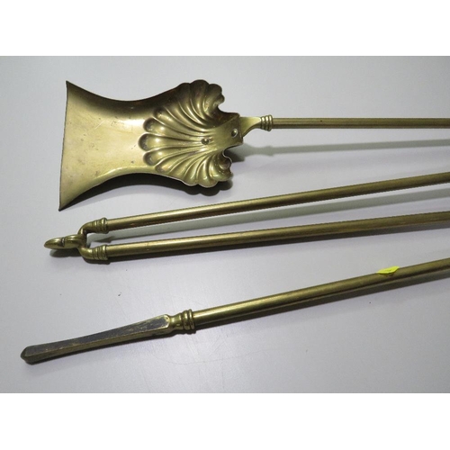 250 - A VINTAGE BRASS THREE PIECE FIRESIDE COMPANION SET