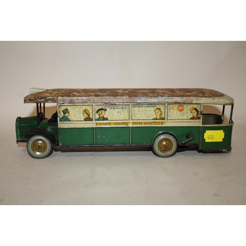 255 - A VINTAGE FRENCH TIN PLATE WIND UP BUS TOY