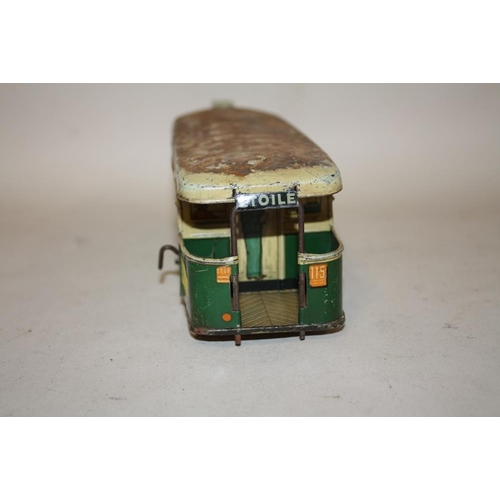 255 - A VINTAGE FRENCH TIN PLATE WIND UP BUS TOY