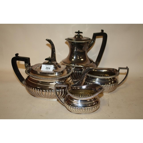 284 - A FOUR PIECE SILVER PLATED TEA SET