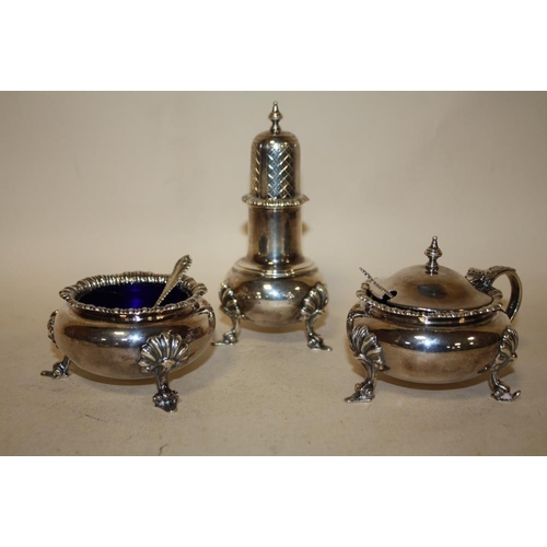 301 - A LARGE HALLMARKED SILVER THREE PIECE CRUET SET WITH BLUE GLASS LINERS, STAMPED HARRODS LONDON, WEIG... 