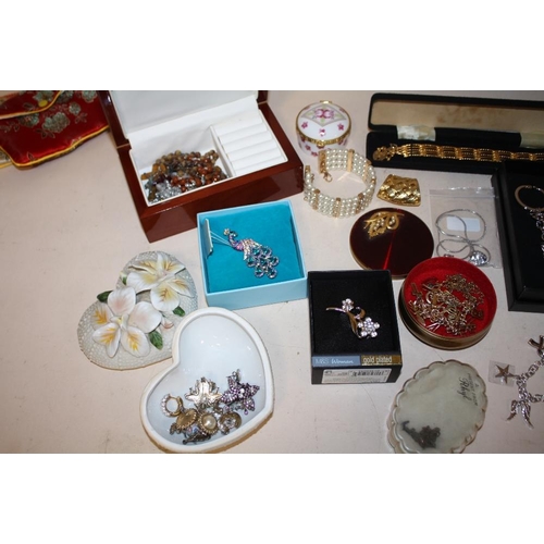 373 - A BOX OF COSTUME JEWELLERY