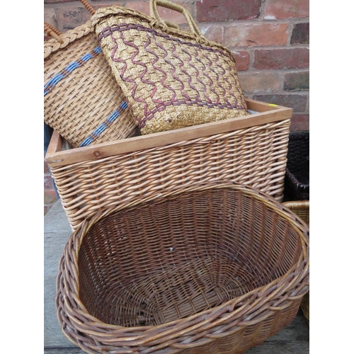 206 - A COLLECTION OF WICKER BASKETS