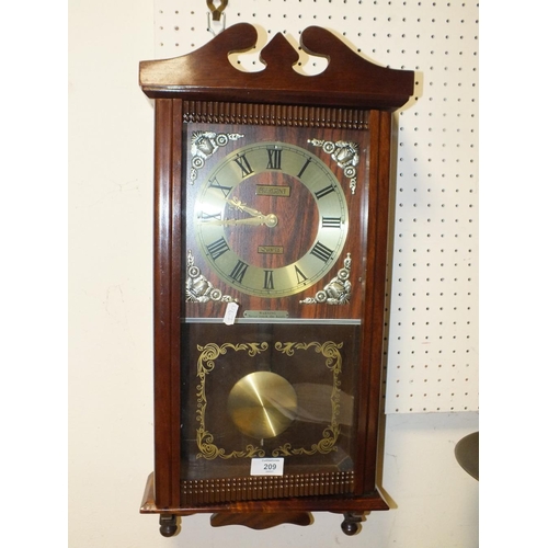 209 - A REPRODUCTION PRESIDENT WALL CLOCK