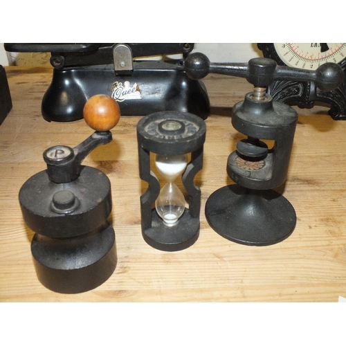 213 - TWO SETS OF CAST METAL SCALES TOGETHER WITH A CAST METAL TABLE TOP PRESS AND A PEPPER GRINDER