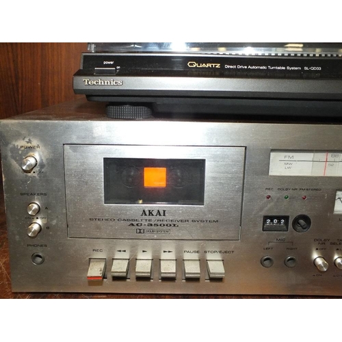 236 - A TECHNICS SL-QD33 TURNTABLE TOGETHER WITH AN AKAI STEREO CASSETTE RECEIVER SYSTEM