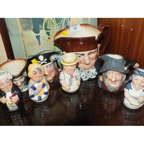 237 - FOUR ROYAL DOULTON 'DOULTONVILLE' FIGURES TOGETHER WITH FOUR CHARACTER JUGS TO INCLUDE LONG JOHN SIL... 