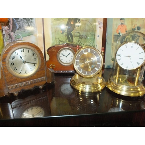 239 - FOUR ASSORTED MANTEL CLOCKS TO INCLUDE A GLASS DOMED EXAMPLE