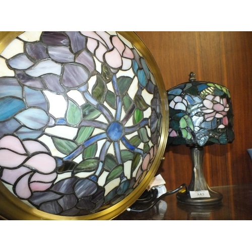 243 - A SMALL TIFFANY STYLE TABLE LAMP WITH GLASS SHADE, HEIGHT 29 CM, TOGETHER WITH A SIMILAR CEILING LIG... 