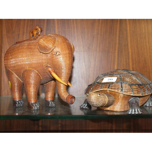 245 - TWO ORIENTAL HAND WOVEN LIDDED BOXES, IN THE FORM OF A TORTOISE AND AN ELEPHANT