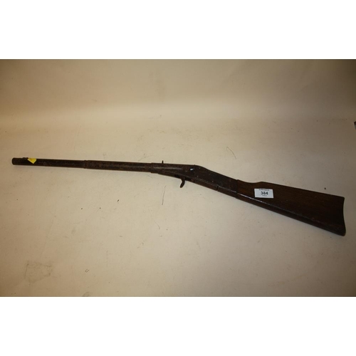 384 - A FAIR GROUND STYLE SPRING LOADED GUN