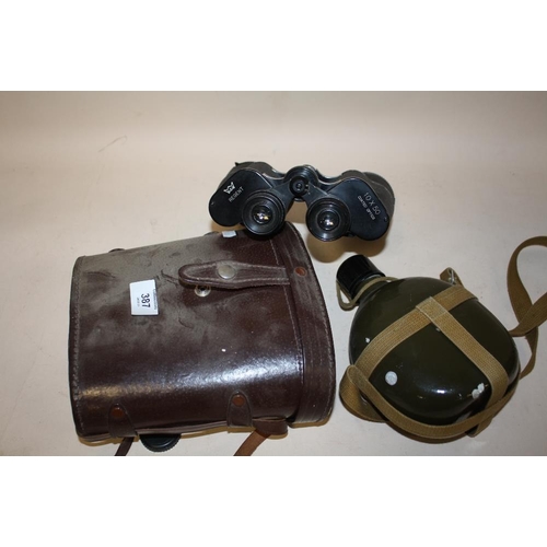 387 - A CASED PAIR OF REGENT 10X50 BINOCULARS TOGETHER WITH A MILITARY STYLE FLASK