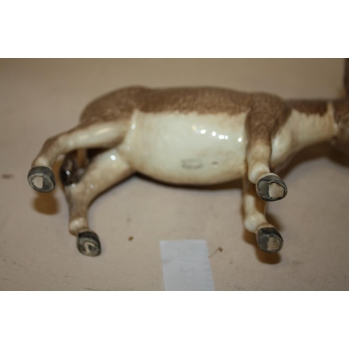 392 - A BESWICK DONKEY AND BESWICK ALSATIAN FIGURE PLUS THREE OTHER FIGURES (5)