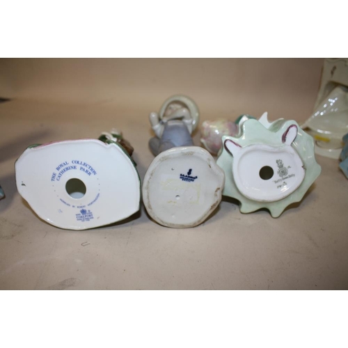 402 - A COLLECTION OF ASSORTED CERAMIC LADY FIGURES TO INCLUDE COALPORT AND OTHER EXAMPLES A/F