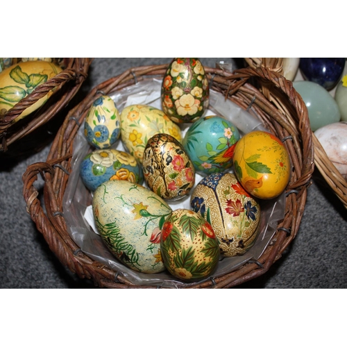 238 - A BASKET OF POLISHED HARD STONE EGGS TOGETHER WITH TWO BASKETS OF HAND PAINTED WOODEN EGGS