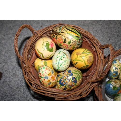 238 - A BASKET OF POLISHED HARD STONE EGGS TOGETHER WITH TWO BASKETS OF HAND PAINTED WOODEN EGGS