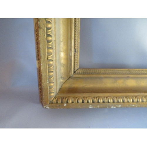 50 - A 19TH CENTURY GOLD FRAME WITH EGG AND DART DESIGN TO OUTER EDGE, frame W 10 cm, frame rebate 102 x ... 