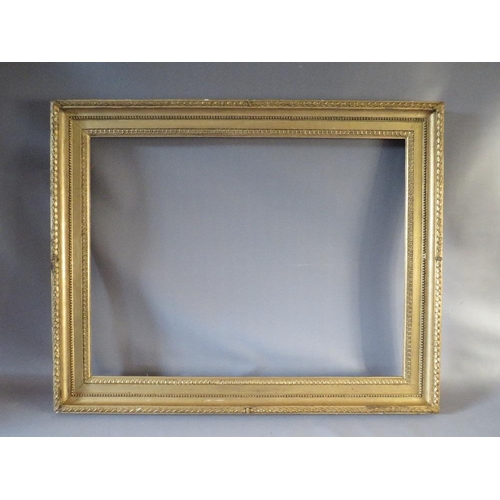 51 - A 19TH CENTURY GOLD FRAME WITH ACANTHUS LEAF DESIGN TO OUTER EDGE, frame W 8 cm, frame rebate 80.5 x... 