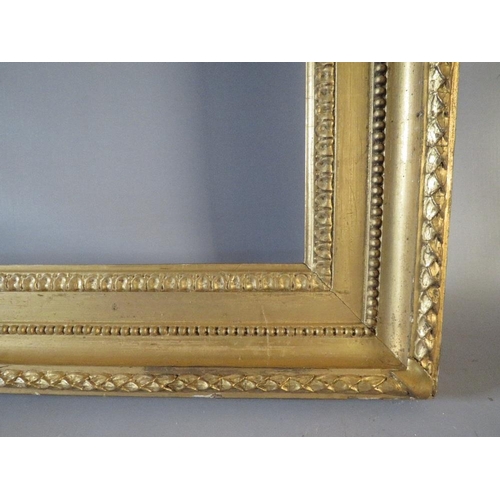 51 - A 19TH CENTURY GOLD FRAME WITH ACANTHUS LEAF DESIGN TO OUTER EDGE, frame W 8 cm, frame rebate 80.5 x... 