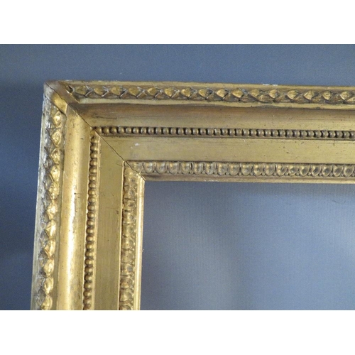 51 - A 19TH CENTURY GOLD FRAME WITH ACANTHUS LEAF DESIGN TO OUTER EDGE, frame W 8 cm, frame rebate 80.5 x... 