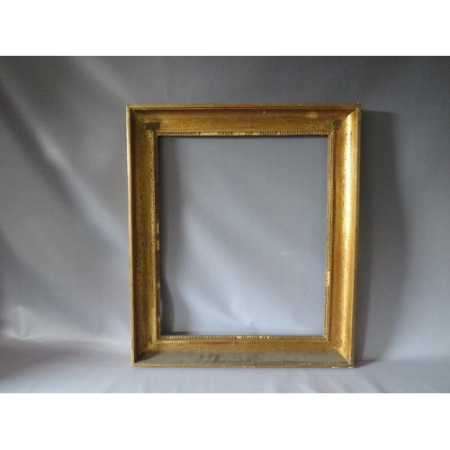 55 - AN 18TH CENTURY FRENCH GOLD FRAME, frame W 8 cm, frame rebate 35.5 x 55 cm