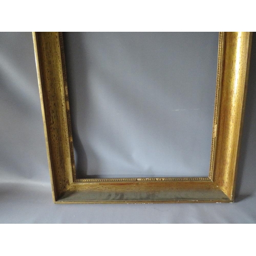 55 - AN 18TH CENTURY FRENCH GOLD FRAME, frame W 8 cm, frame rebate 35.5 x 55 cm