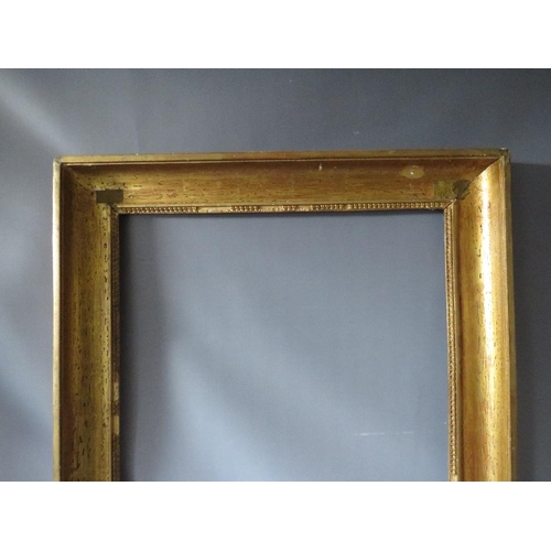 55 - AN 18TH CENTURY FRENCH GOLD FRAME, frame W 8 cm, frame rebate 35.5 x 55 cm