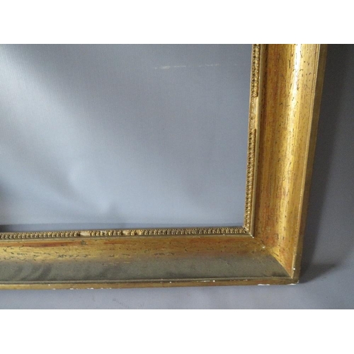 55 - AN 18TH CENTURY FRENCH GOLD FRAME, frame W 8 cm, frame rebate 35.5 x 55 cm