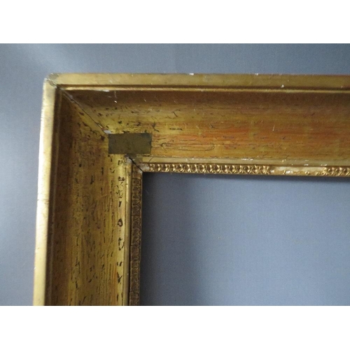 55 - AN 18TH CENTURY FRENCH GOLD FRAME, frame W 8 cm, frame rebate 35.5 x 55 cm