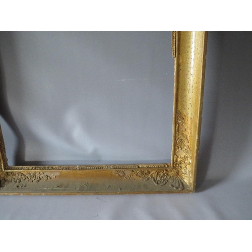 56 - AN 18TH CENTURY FRENCH DECORATIVE GOLD FRAME WITH INTEGRAL SLIP, frame W 8 cm, frame rebate 66 x 55 ... 