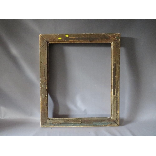 56 - AN 18TH CENTURY FRENCH DECORATIVE GOLD FRAME WITH INTEGRAL SLIP, frame W 8 cm, frame rebate 66 x 55 ... 