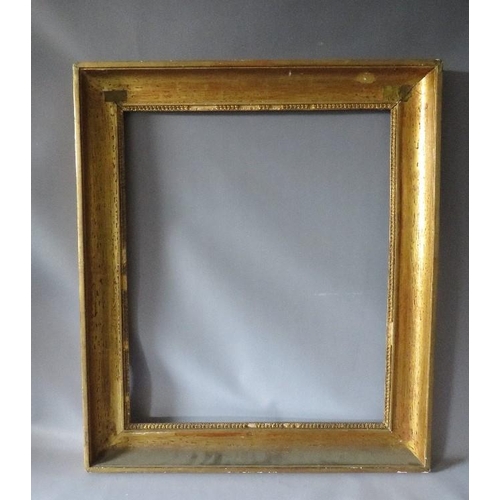 56 - AN 18TH CENTURY FRENCH DECORATIVE GOLD FRAME WITH INTEGRAL SLIP, frame W 8 cm, frame rebate 66 x 55 ... 