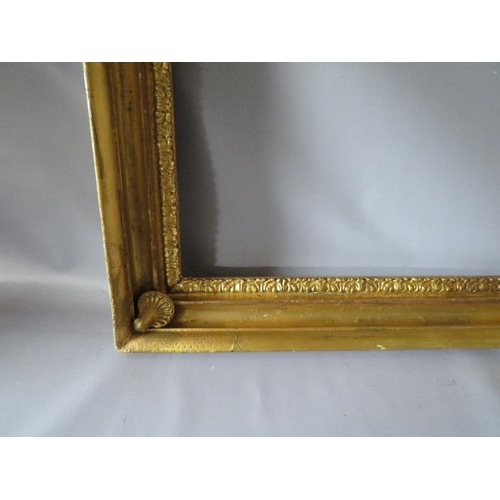 57 - AN 18TH CENTURY GOLD FRAME WITH SHELL EMBELLISHMENTS TO INNER CORNERS, frame W 7 cm, frame rebate 59... 