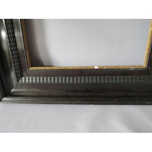 58 - A 19TH CENTURY EBONISED DUTCH FRAME, frame W 12 cm, frame rebate 53 x 39 cm