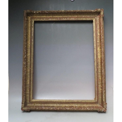 59 - A 20TH CENTURY DECORATIVE GOLD FRAME WITH CORNER EMBELLISHMENTS, frame W 7 cm, frame rebate 58.5 x 4... 