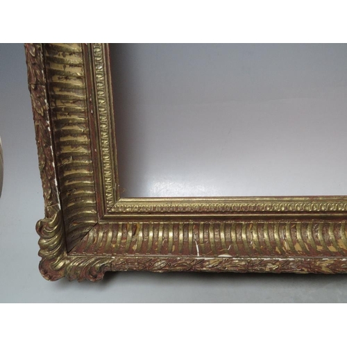 59 - A 20TH CENTURY DECORATIVE GOLD FRAME WITH CORNER EMBELLISHMENTS, frame W 7 cm, frame rebate 58.5 x 4... 