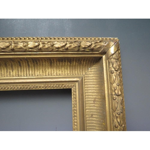 62 - A 19TH CENTURY GOLD FRAME WITH ACANTHUS LEAF DESIGN TO OUTER EDGE, frame W 9.5 cm, frame rebate 46.5... 