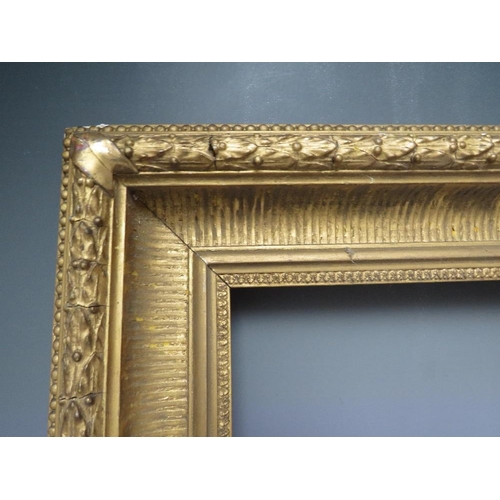 62 - A 19TH CENTURY GOLD FRAME WITH ACANTHUS LEAF DESIGN TO OUTER EDGE, frame W 9.5 cm, frame rebate 46.5... 